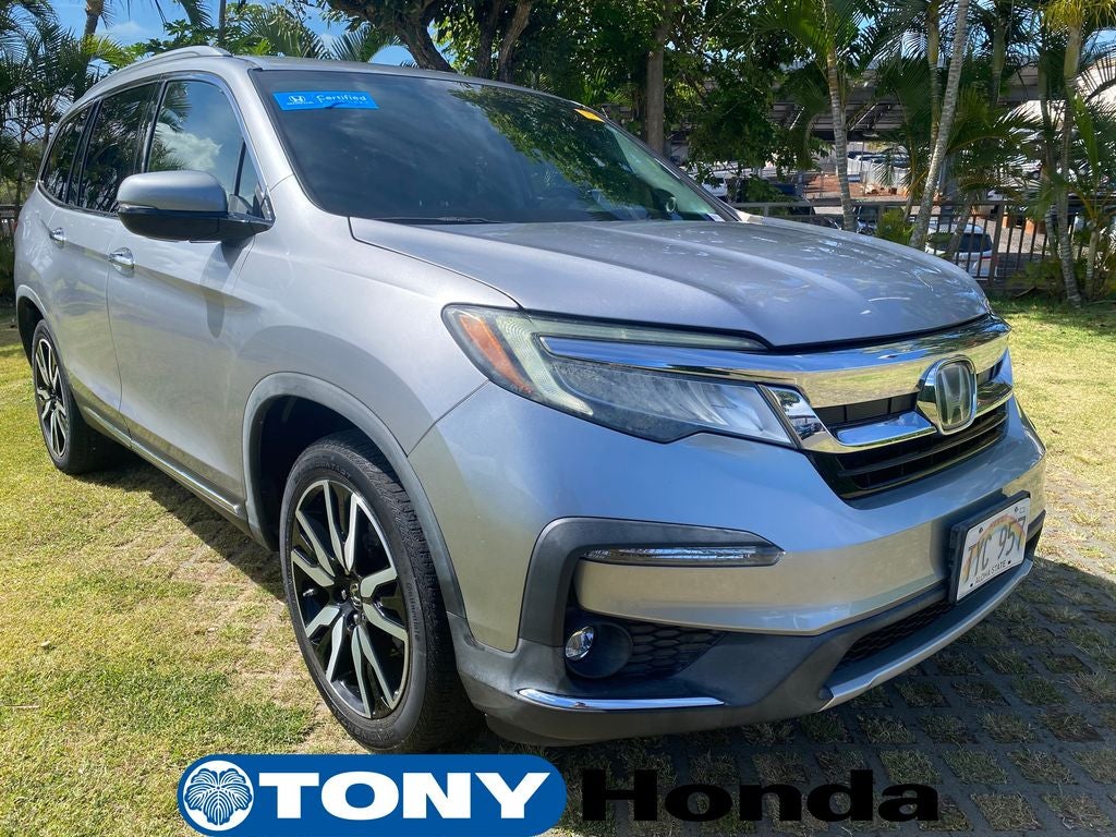 2019 Honda Pilot Touring 8 Passenger in Silver — front three-quarter view