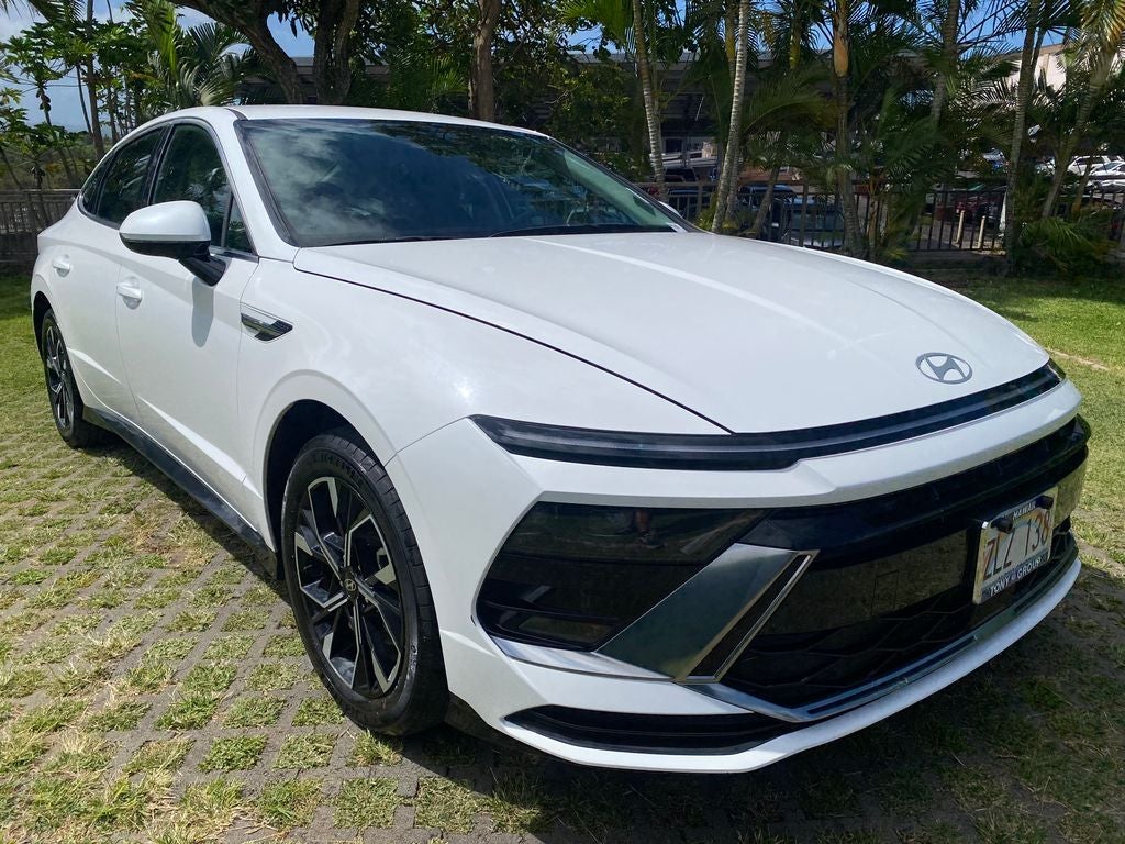 2024 Hyundai Sonata SEL in Serenity White — front three-quarter view