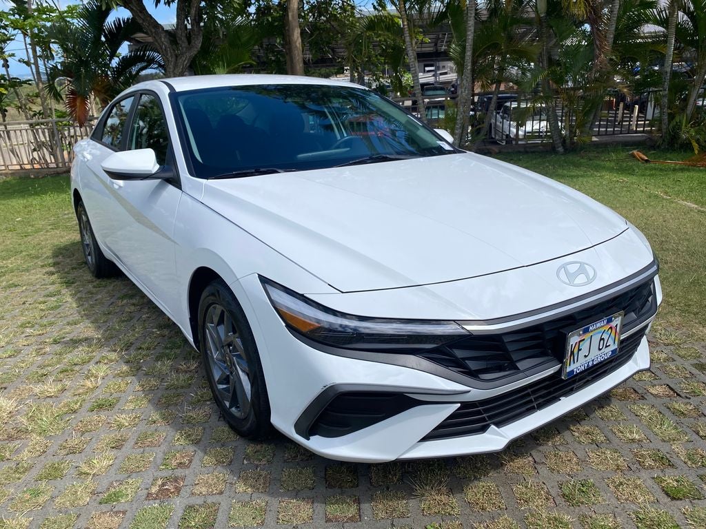 2024 Hyundai Elantra SEL in Serenity White — front three-quarter view