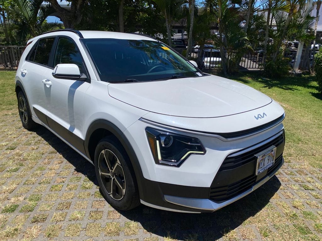 2024 Kia Niro EX in Snow White Pearl — front three-quarter view