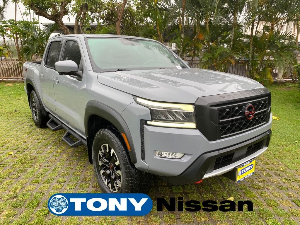 2023 Nissan Frontier PRO-4X in Boulder Gray Pearl — front three-quarter view